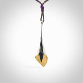 Sterling Silver drop pendant with Black Jade centre. Hand carved for NZ Pacific. Handmade jewellery for sale online. The cord is a 3-braid plait in flax and grape and is adjustable. Sterling silver drop with black jade centre necklace for men and women. Drop necklace hand made from black jade stone with sterling silver.